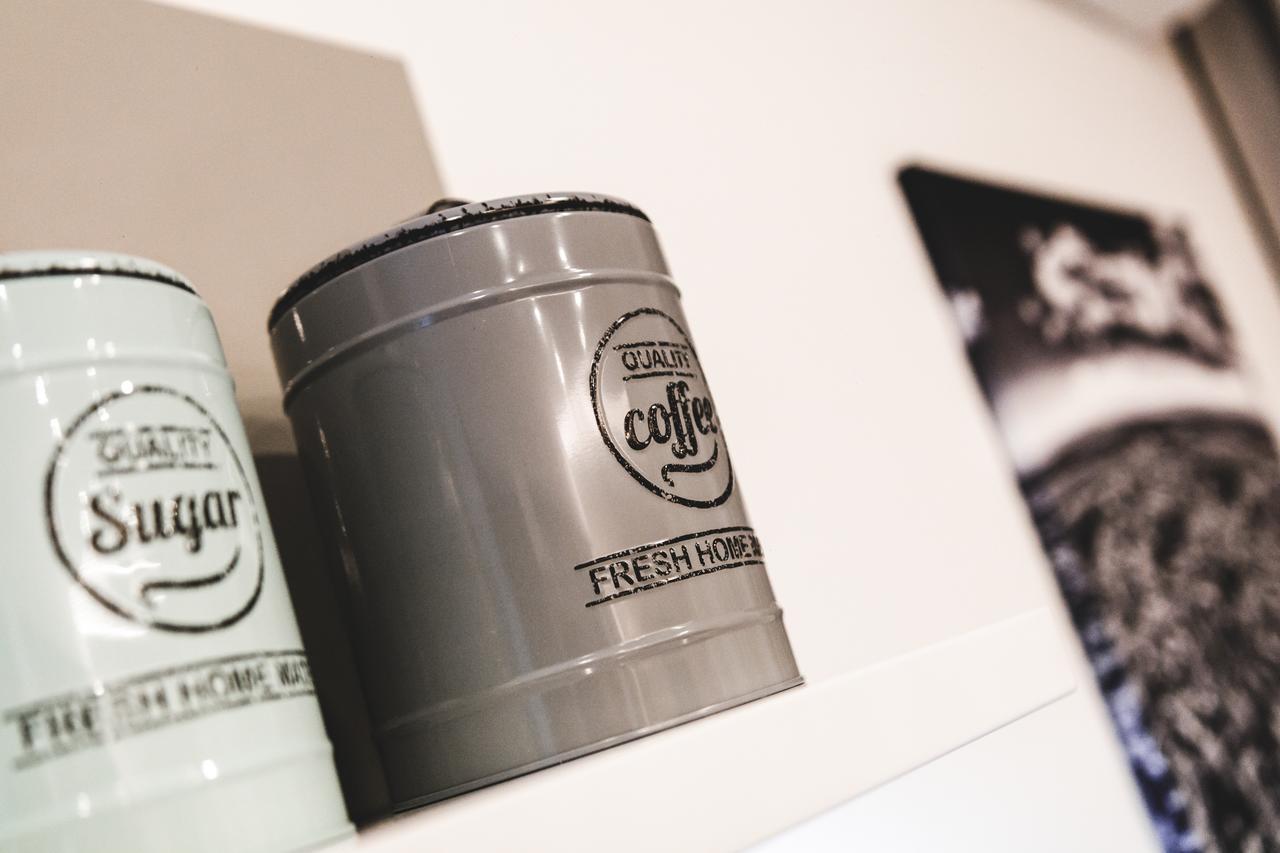 Silesia Residence Ostrava Kültér fotó Coffee and sugar storage tins